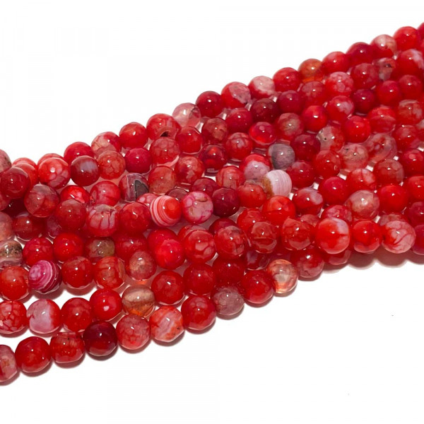 6 mm. Perles agate à facettes rouge. Fil de 60-63 perles. Teintée
