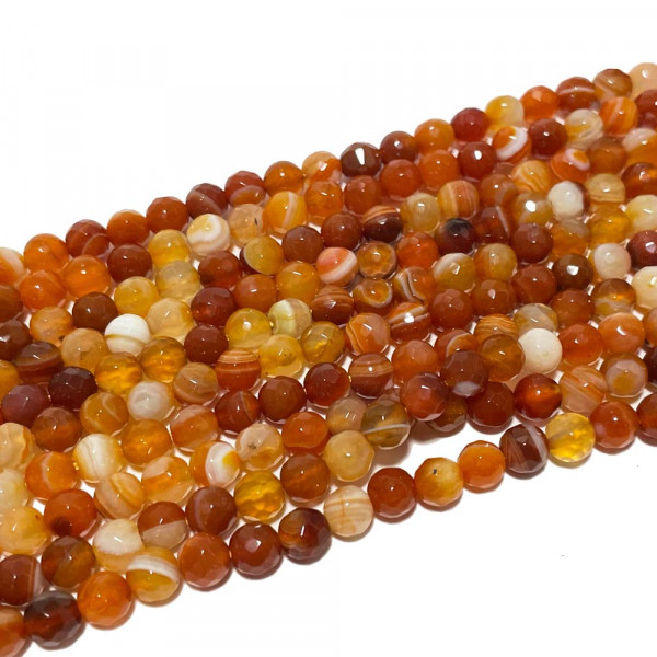 6 mm. Perles naturelle à facettes, orange. Fil de 58 -60 perles, teintée