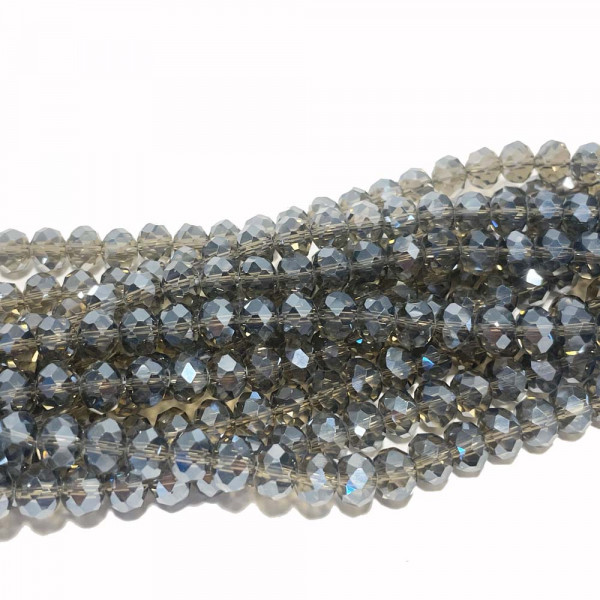8*6 mm. Perles verre à facettes gris fumé irisé. 68 p.