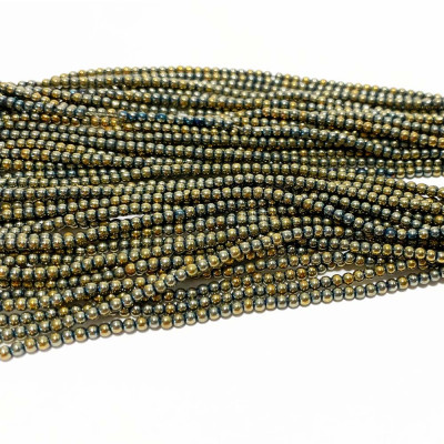 2,5 mm. Perles de rocaille dore kaki. Fil 177 p