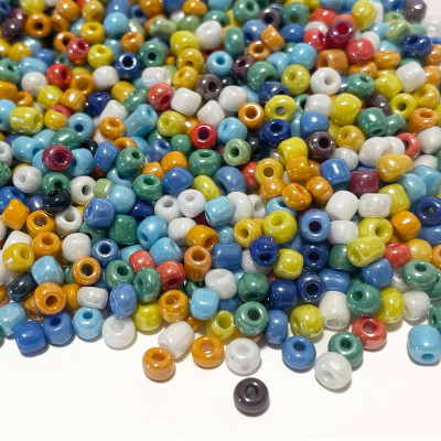 30g. Mix de perles de rocaille 4 mm. Env 350 p.