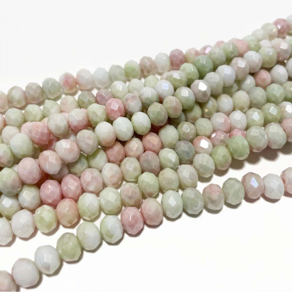 8*6 mm. Perles verre facettes vert rosé. Env 66 p