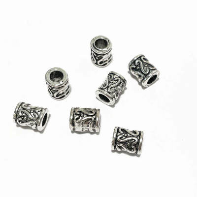 8 mm . Perle tube motif en zamac argenté. Création bijoux