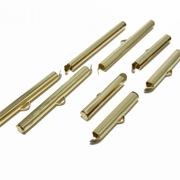 25 ou 40 mm. 4 Tubes à glissière acier inoxydable plaqué or 18 k