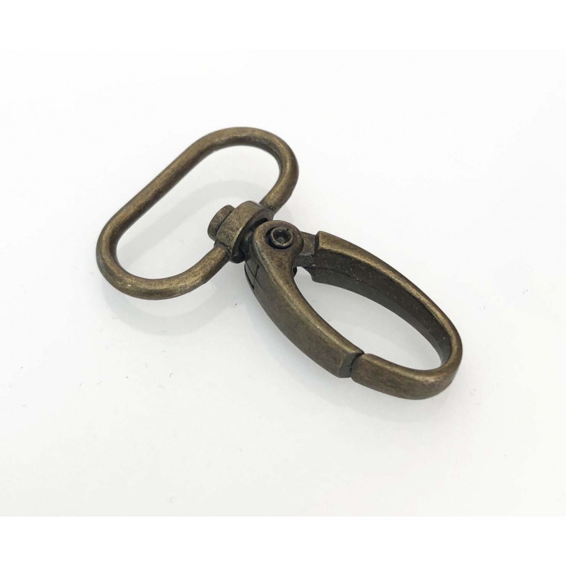 Mousqueton pour porte clé ou sac. Métal bronze 4,5*3 cm.