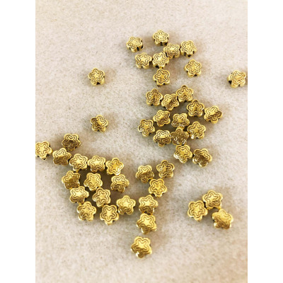 10 perles étoile, alliage doré. 7 mm