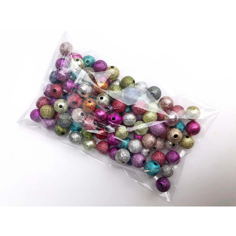 100 perles en acrylique stardust multicolore. Diam 8 mm.