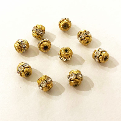 10 perles alliage et strass. 8 mm. Doré