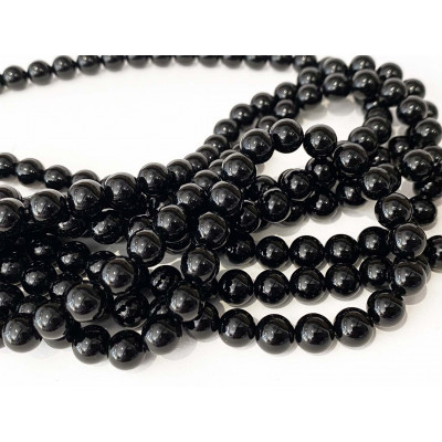 8 mm, Onyx noir naturel. Le fil env. 50 perles