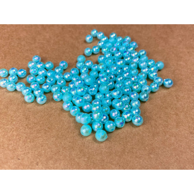 50 boules bleu 6 mm. acrylique irisé
