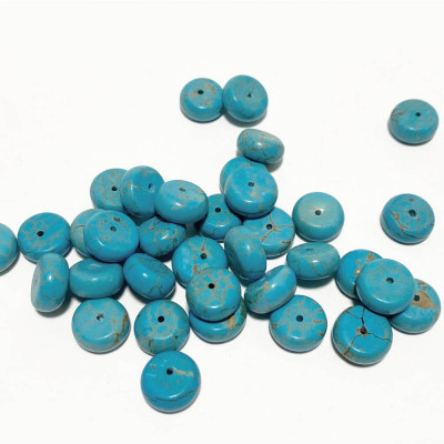 10*5 mm. 10 rondelles en howlite synthétique. Turquoise