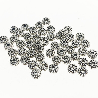 50 perles séparateurs 6*2 mm en alliage argenté.