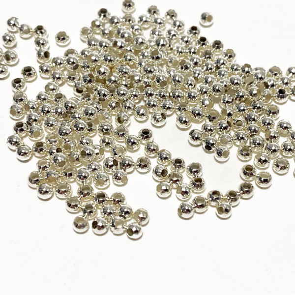 Perles séparateurs en laiton argenté. Env. 460 perles.