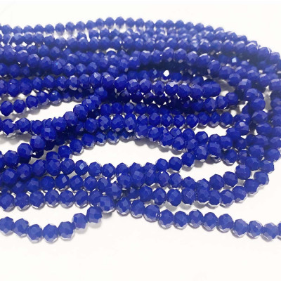 6*5 mm. Perles en verre à facettes. Bleu foncé. Fil d'environ 88 perles