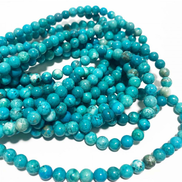 6 mm. Perles en howlite naturel teintée turquoise. fil d'environ 60 perles
