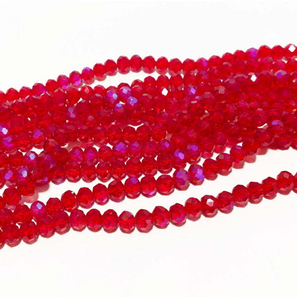 6*5 mm. Perles verre à facettes. Magenta irisé. Environ 87 perles