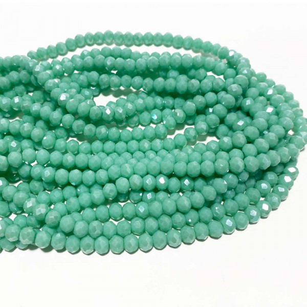 6*5 mm. Perles en verre à facettes. Turquoise. Environ 88 perles