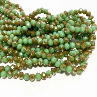 6*5 mm, perles verre à facettes. Vert plaqué cuivré. Fil de 88 perles env.