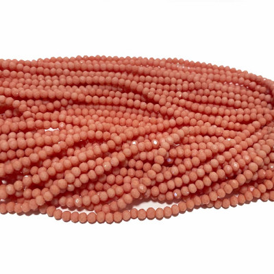 4*3 mm. Perles verre à facettes rose saumoné. Fil de 130 perles.