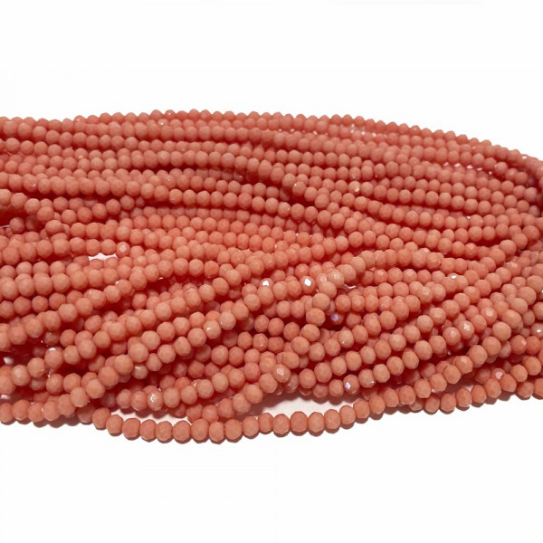 4*3 mm. Perles verre à facettes rose saumoné. Fil de 130 perles.